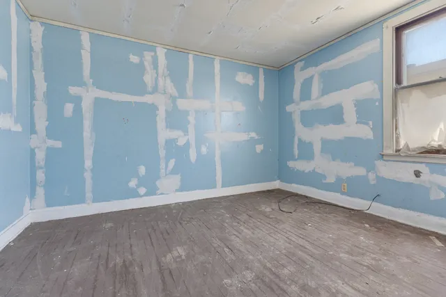 a bathroom with a sink toilet vanity and bathtub