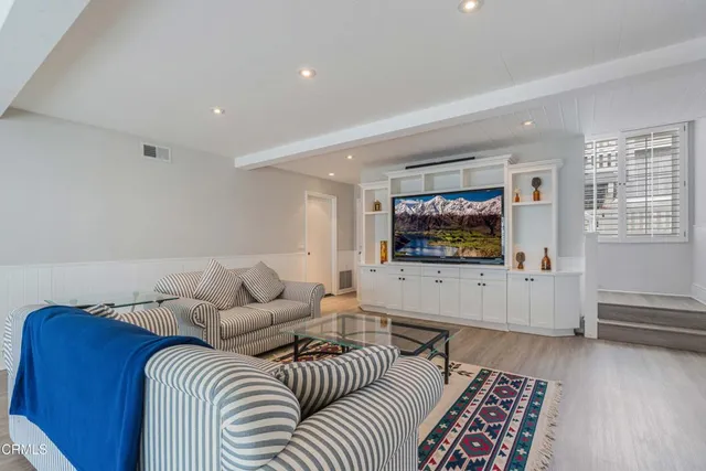 a kitchen with granite countertop a sink and a stove