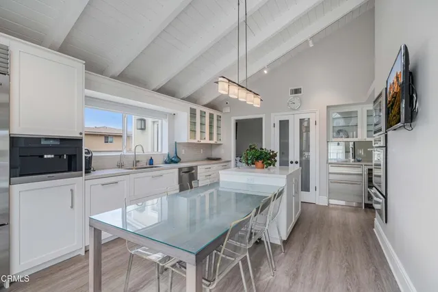 a kitchen with a stove and a microwave