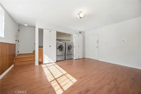 a view of a livingroom with wooden floor
