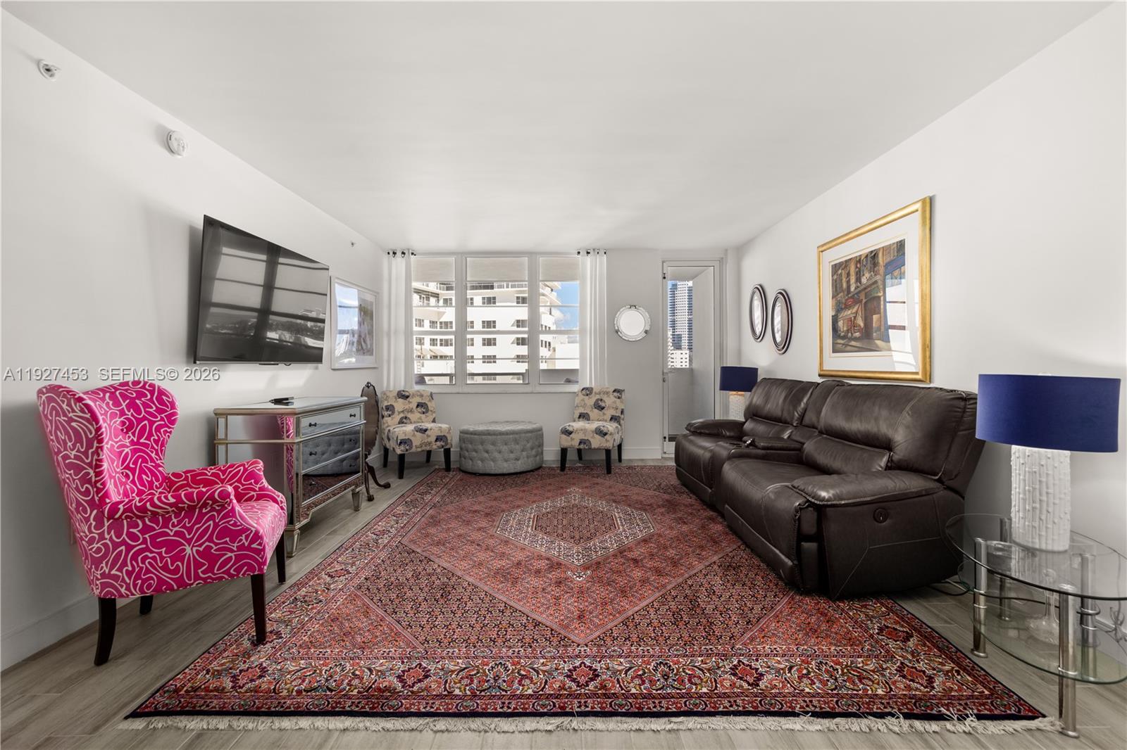 100 Lincoln Road, Unit 643 Miami Beach, FL 33139 - Photo 10 of 17 a living room with furniture rug and window