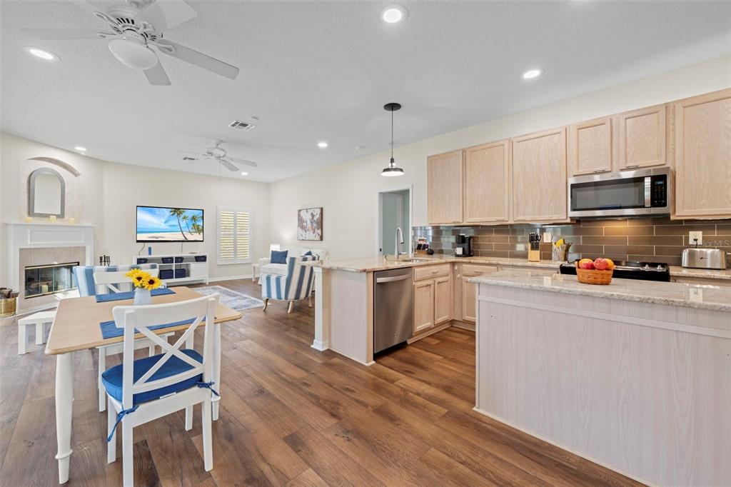 332 McIntosh Court Spring Hill, FL 34609 - Photo 17 of 54 a kitchen with counter space cabinets and appliances
