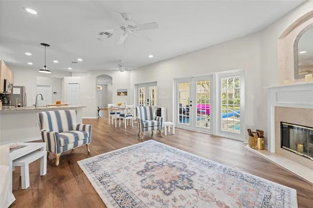 a living room with furniture and a rug