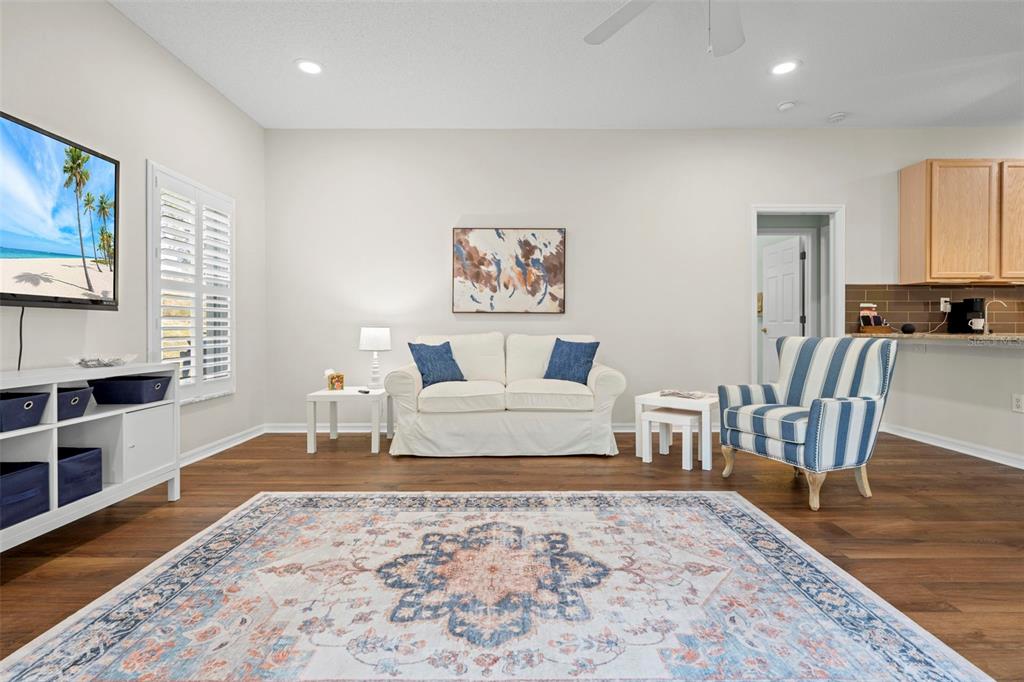 332 McIntosh Court Spring Hill, FL 34609 - Photo 27 of 54 a living room with furniture and a rug