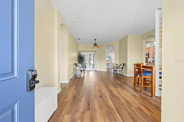 a view of a living room and dining room