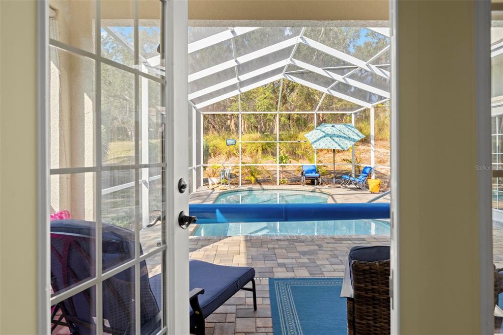 332 McIntosh Court Spring Hill, FL 34609 - Photo 31 of 54 a picture of a glass door with a glass door