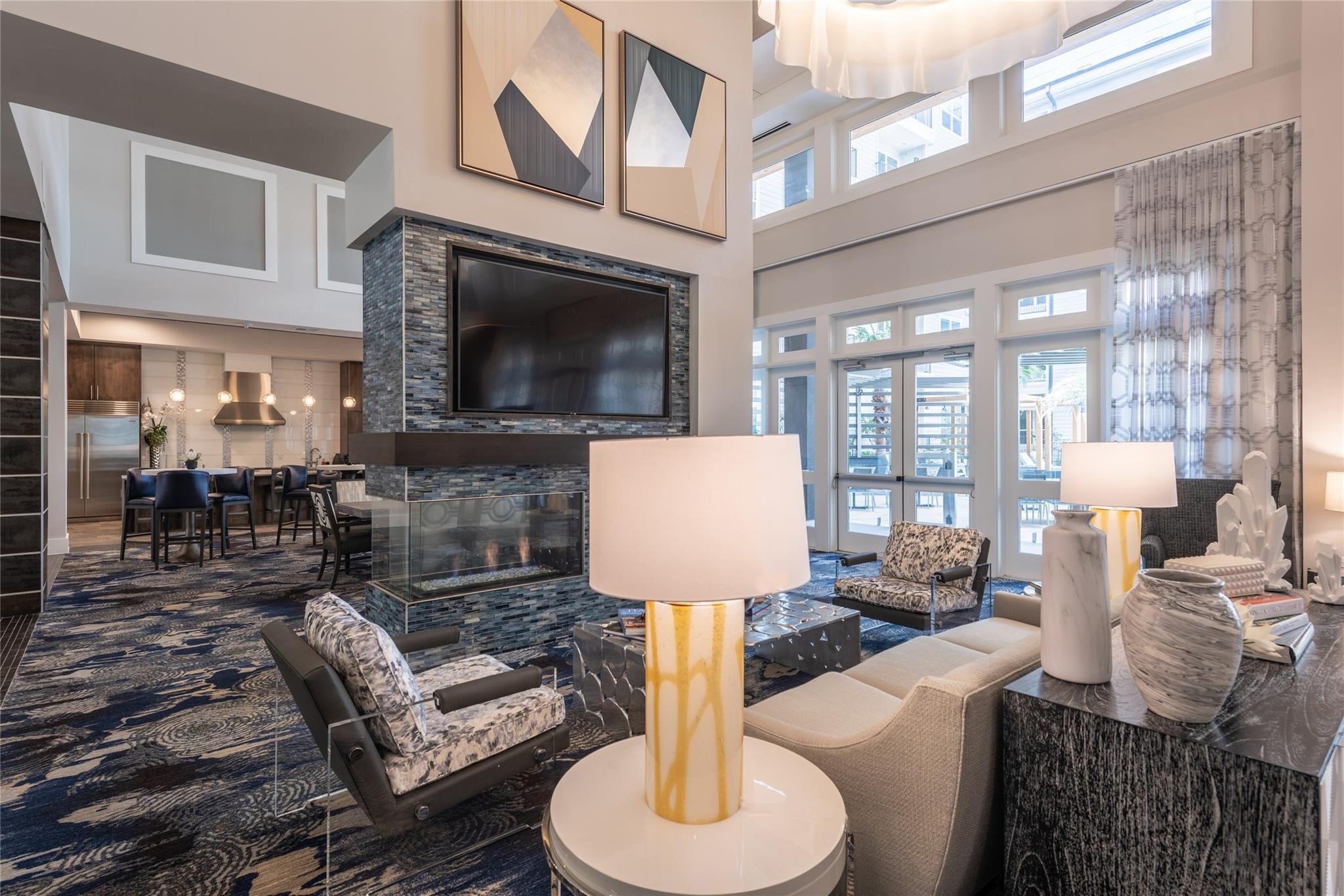 3100 Kramer Lane, Unit 120 Austin, TX 78758 - Photo 9 of 16 a living room with furniture a flat screen tv and a fireplace