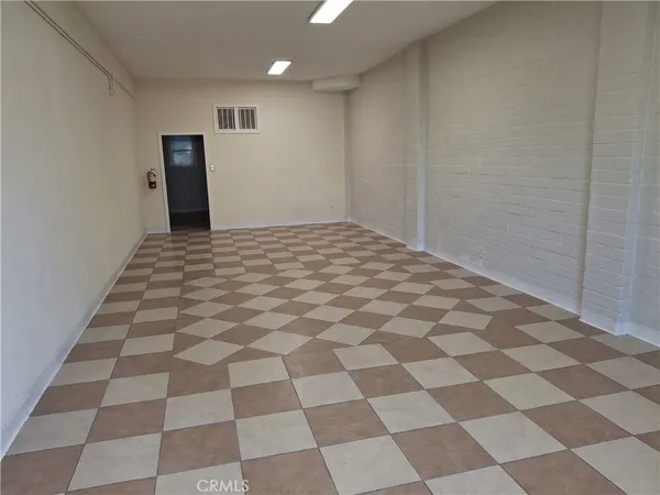 a view of a black and white checkered floor