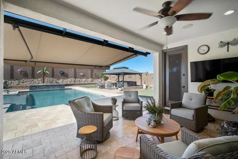a view of a house with a yard porch and sitting area