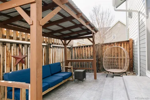 a view of porch with a bench