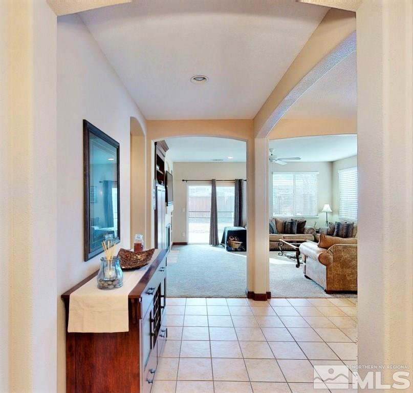 10615 Arbor Way Reno, NV 89521 - Photo 2 of 23 a lobby with furniture and window