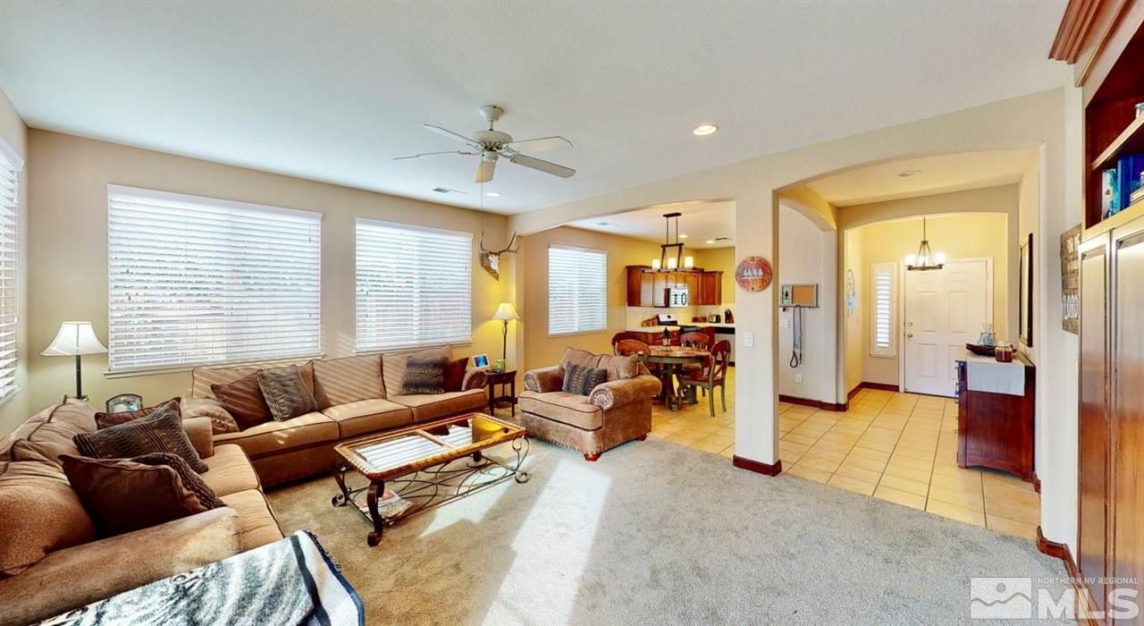 10615 Arbor Way Reno, NV 89521 - Photo 9 of 23 a living room with furniture and a large window