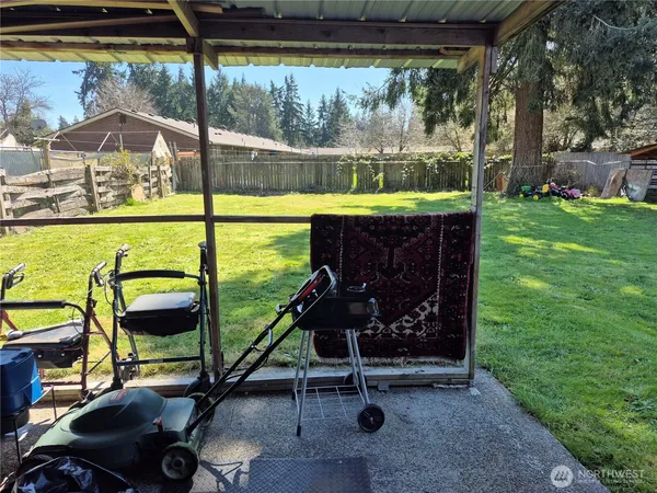 a view of a swimming pool with a porch