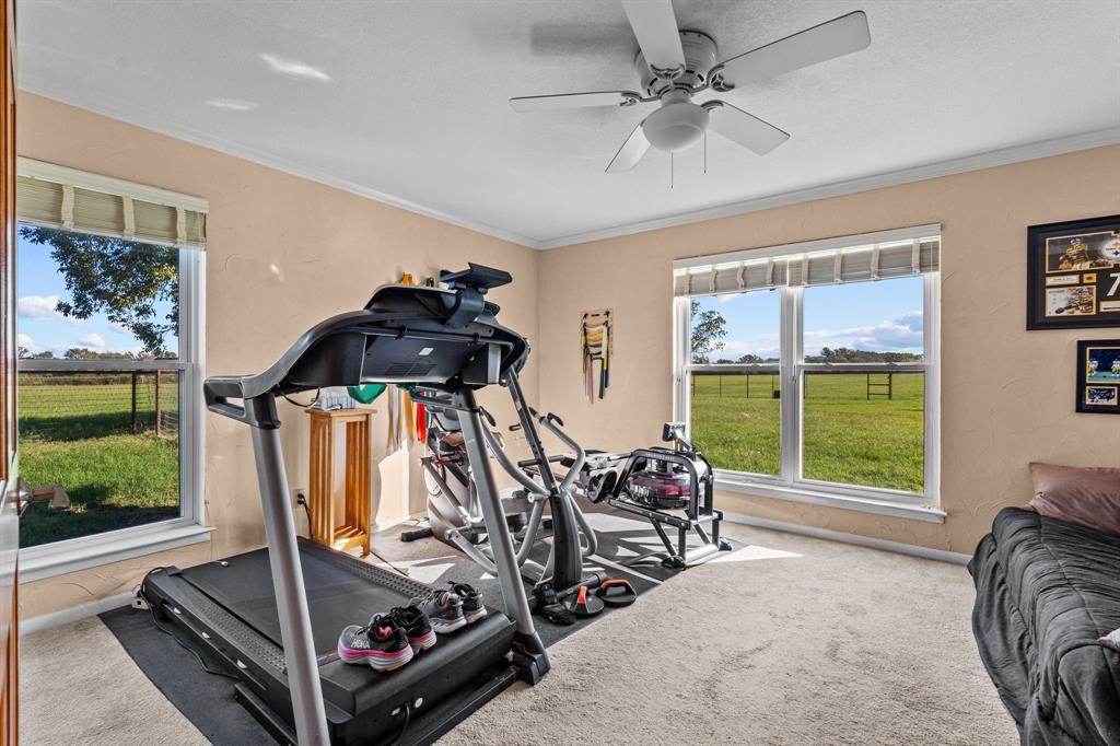 905 Ballew Springs Road Weatherford, TX 76088 - Photo 27 of 40 a view of a room with gym equipment