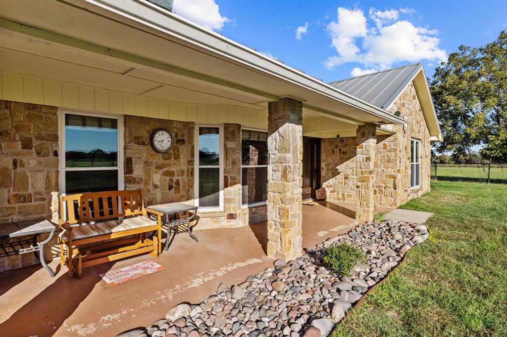 905 Ballew Springs Road Weatherford, TX 76088 - Photo 9 of 40 a building outdoor space with patio furniture