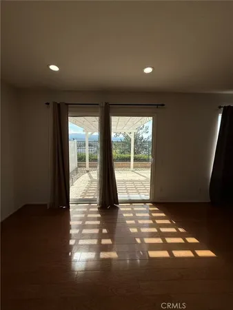 a bathroom with a granite countertop shower and a toilet