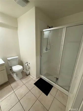 a view of a refrigerator in kitchen