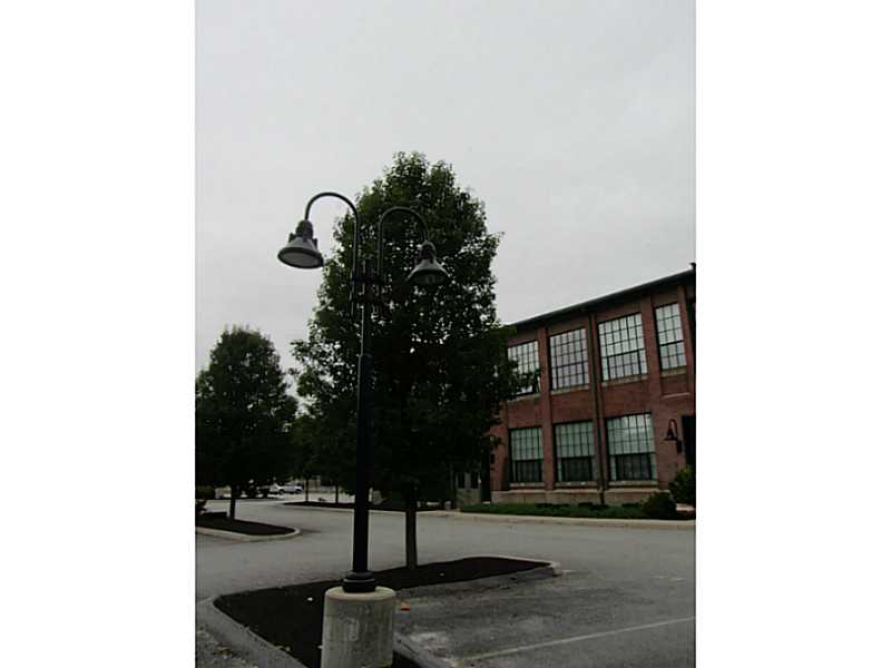 180 Allen Street, Unit 105 Woonsocket, RI 02895 - Photo 20 of 25 Parking Lot/Garage.