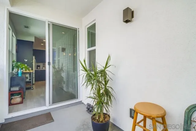 a bathroom with a double vanity sink mirror and shower