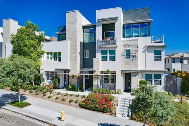 a bathroom with a shower and a sink