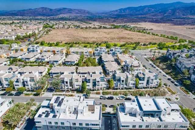 a view of a city with a lake