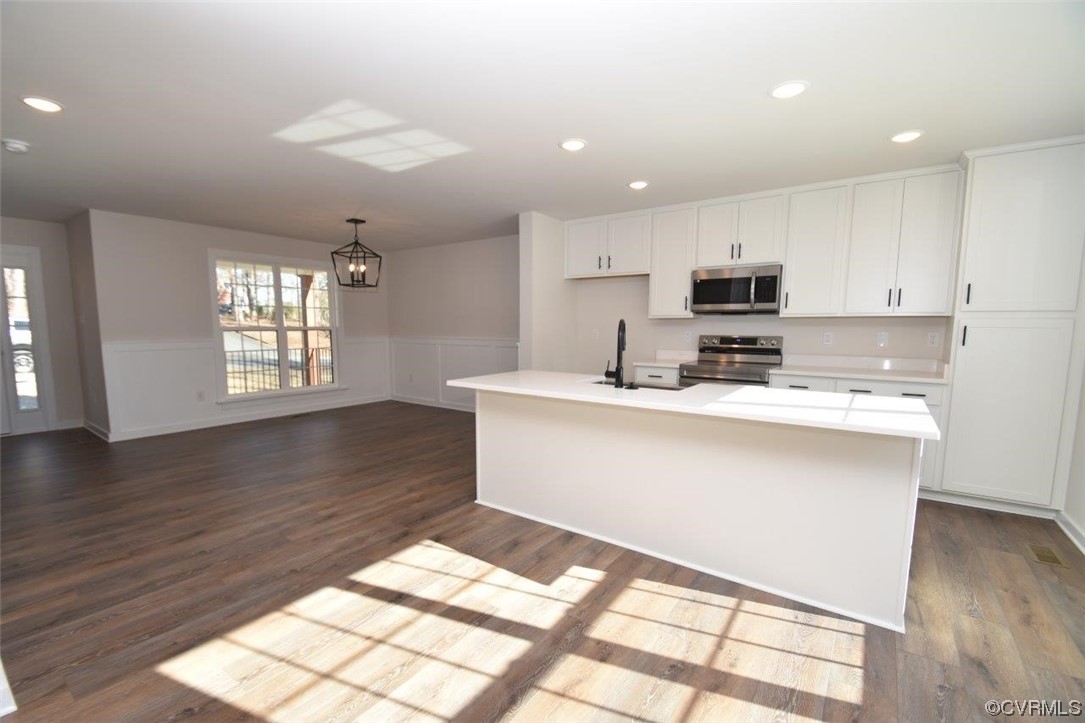 2 Brook Boulevard Quinton, VA 23141 - Photo 6 of 16 a kitchen with stainless steel appliances a refrigerator sink and cabinets