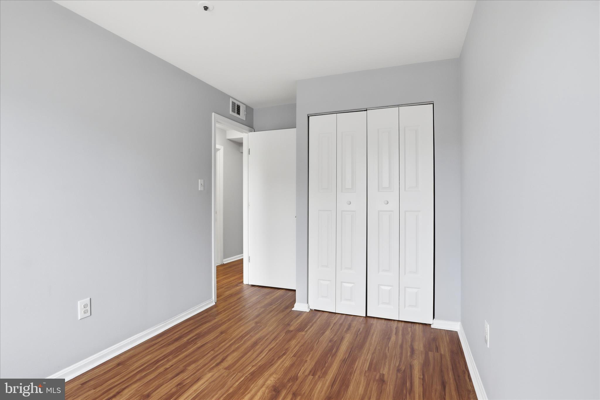 14913 Cleese Court, Unit C Silver Spring, MD 20906 - Photo 21 of 35 a view of hallway with wooden floor