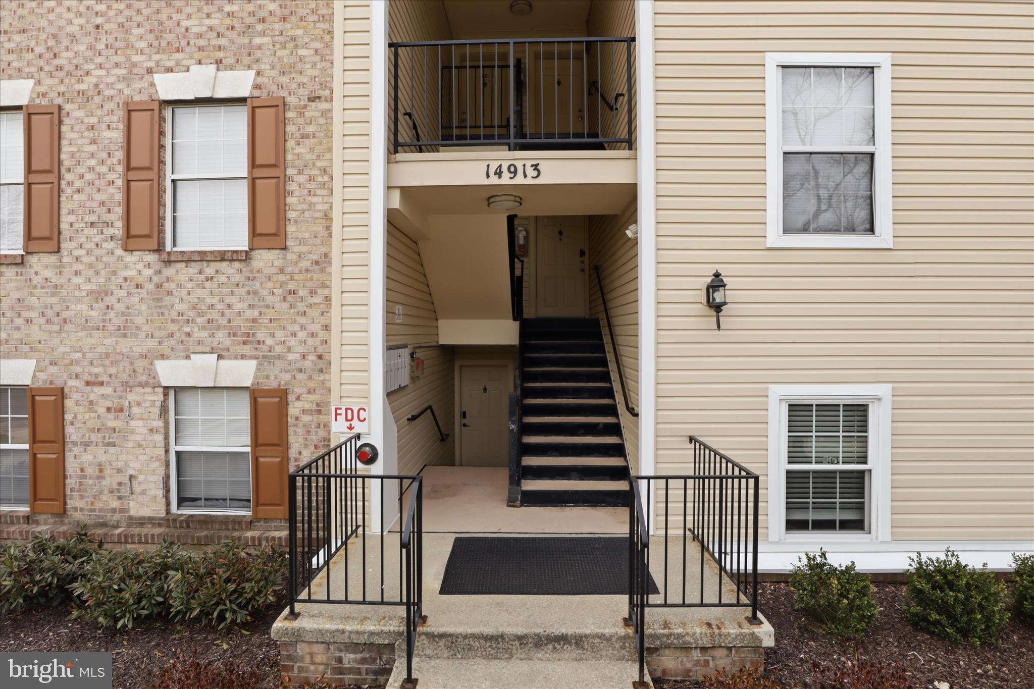 14913 Cleese Court, Unit C Silver Spring, MD 20906 - Photo 3 of 35 a front view of a house with stairs