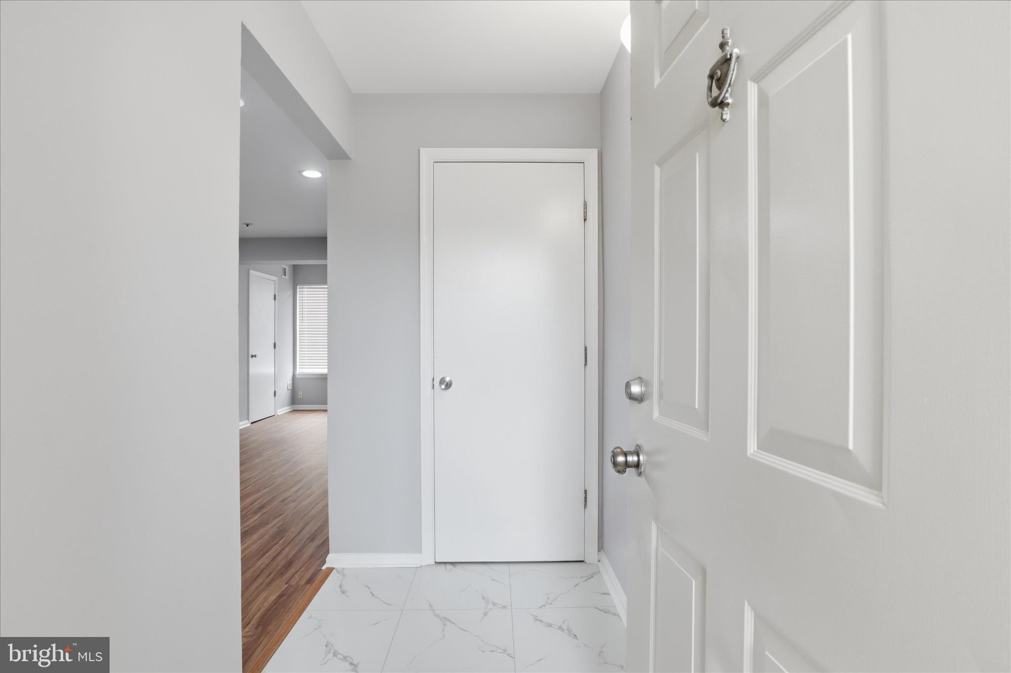 14913 Cleese Court, Unit C Silver Spring, MD 20906 - Photo 5 of 35 a view of a hallway with closet and a bathroom