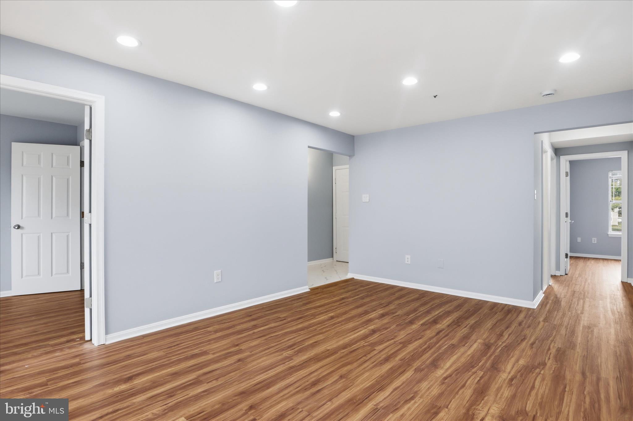 14913 Cleese Court, Unit C Silver Spring, MD 20906 - Photo 8 of 35 wooden floor in an empty room with wooden floor