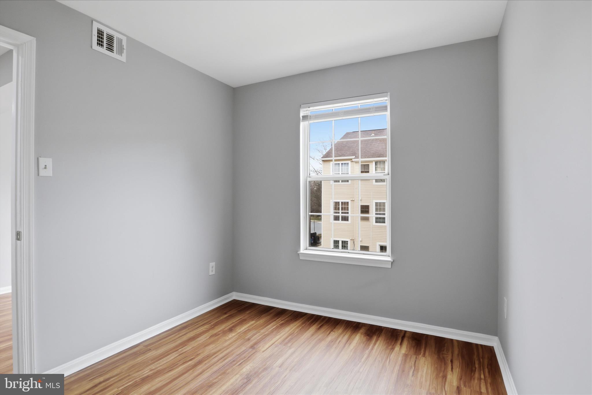 14913 Cleese Court, Unit C Silver Spring, MD 20906 - Photo 9 of 35 an empty room with window