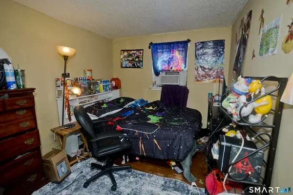 a view of a workspace with furniture