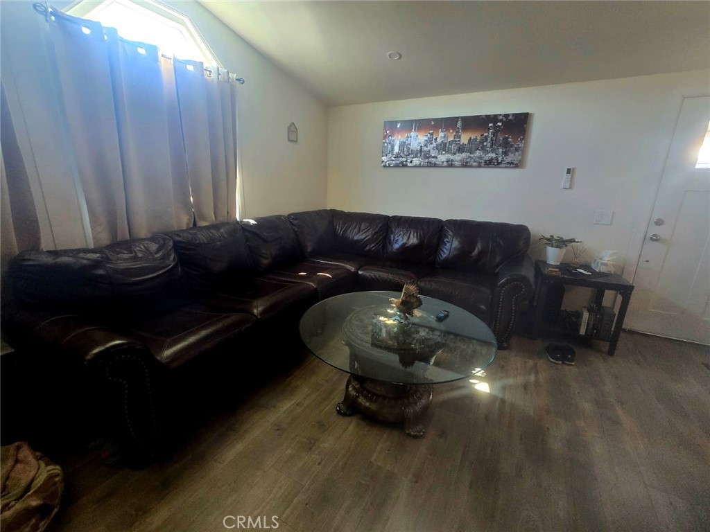 15621 Beach Boulevard, Unit 28 Huntington Beach, CA 92647 - Photo 16 of 27 a living room with furniture