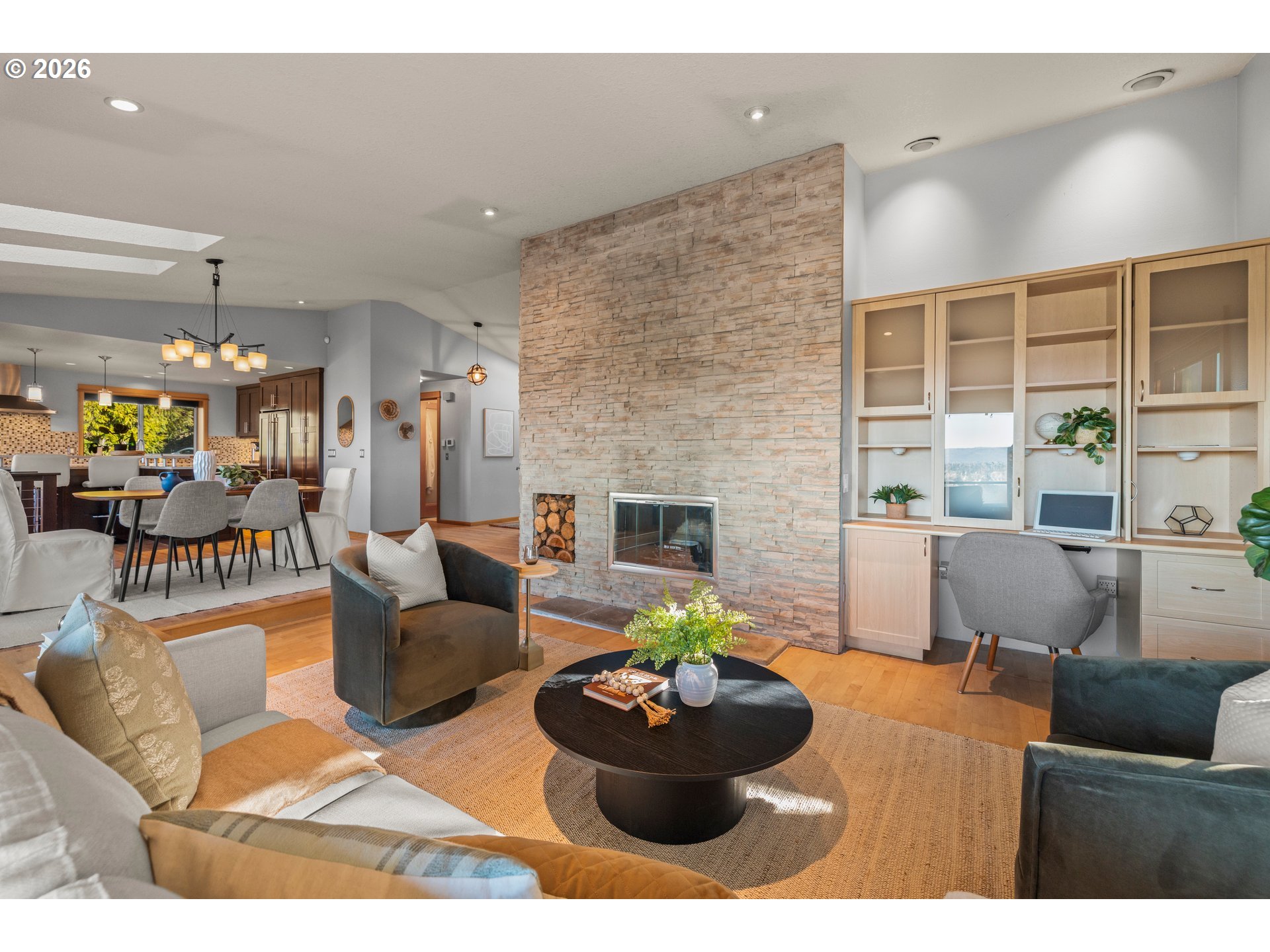 2831 Northeast Rocky Butte Road Portland, OR 97220 - Photo 17 of 33 a living room with furniture and a fireplace