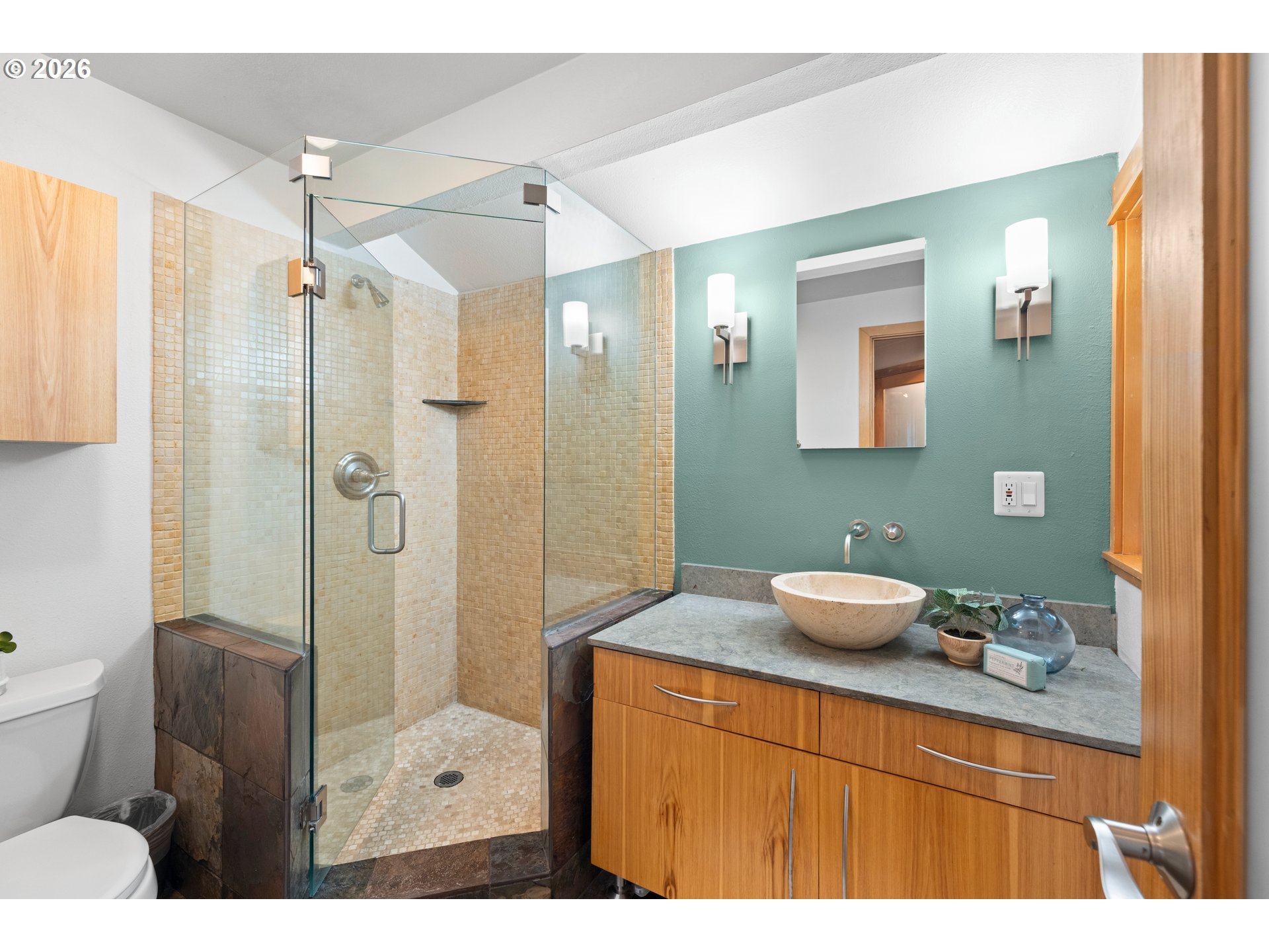 2831 Northeast Rocky Butte Road Portland, OR 97220 - Photo 20 of 33 a bathroom with a sink a toilet and shower