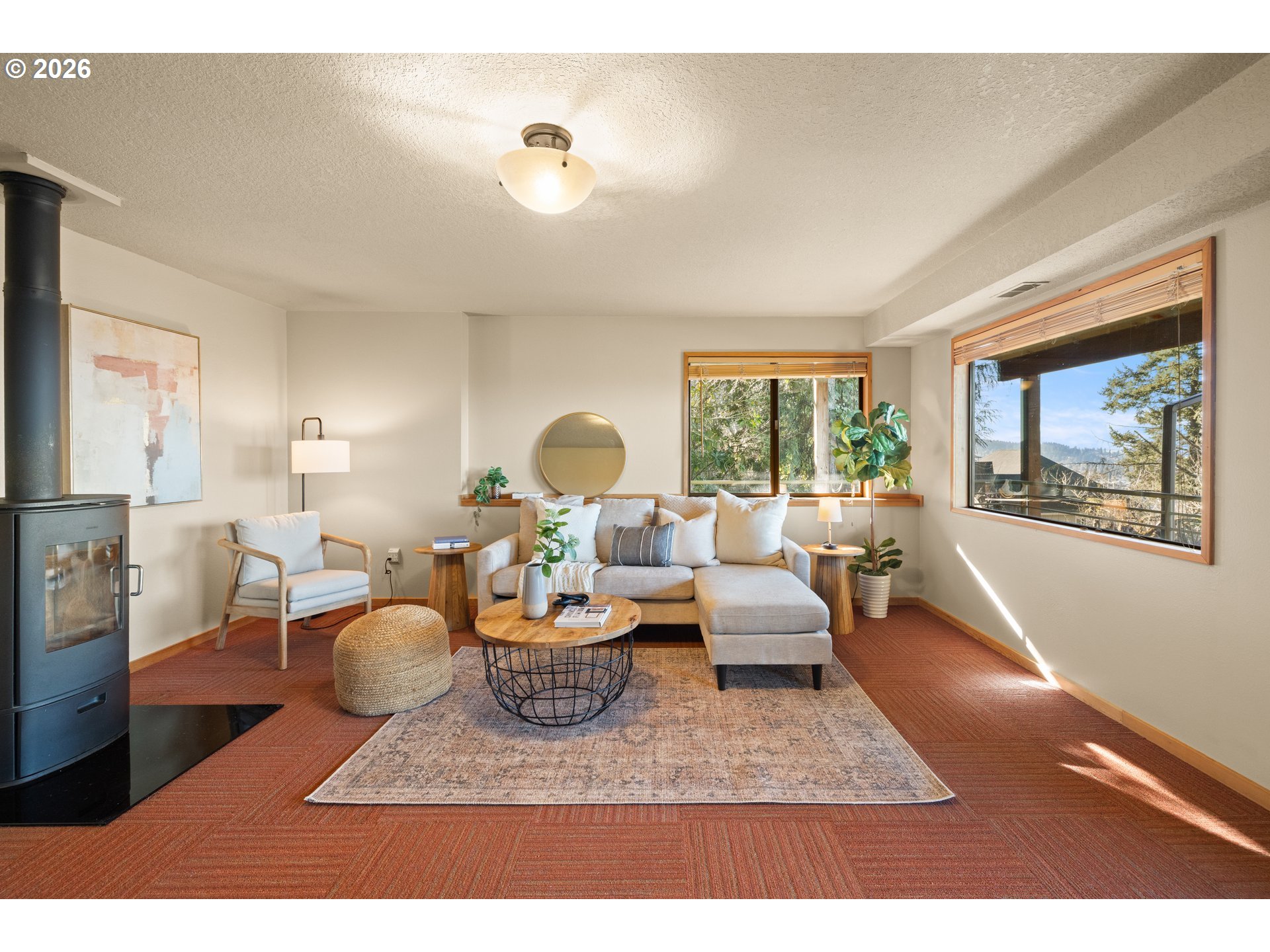 2831 Northeast Rocky Butte Road Portland, OR 97220 - Photo 22 of 33 a living room with furniture and a large window