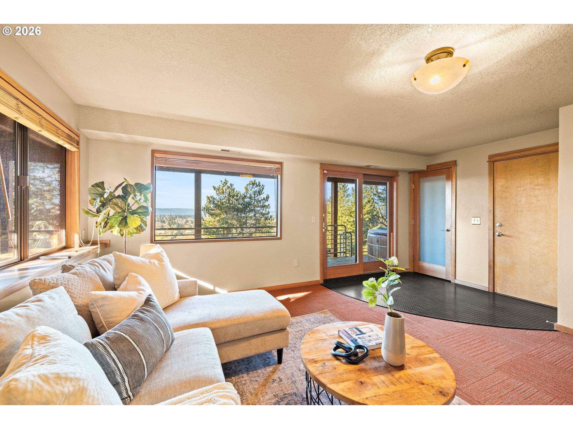 2831 Northeast Rocky Butte Road Portland, OR 97220 - Photo 24 of 33 a living room with furniture and a large window
