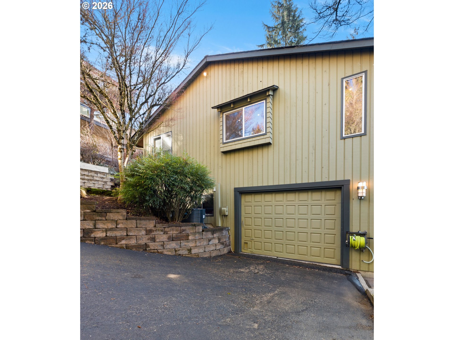 2831 Northeast Rocky Butte Road Portland, OR 97220 - Photo 28 of 33 a front view of a house with a garage