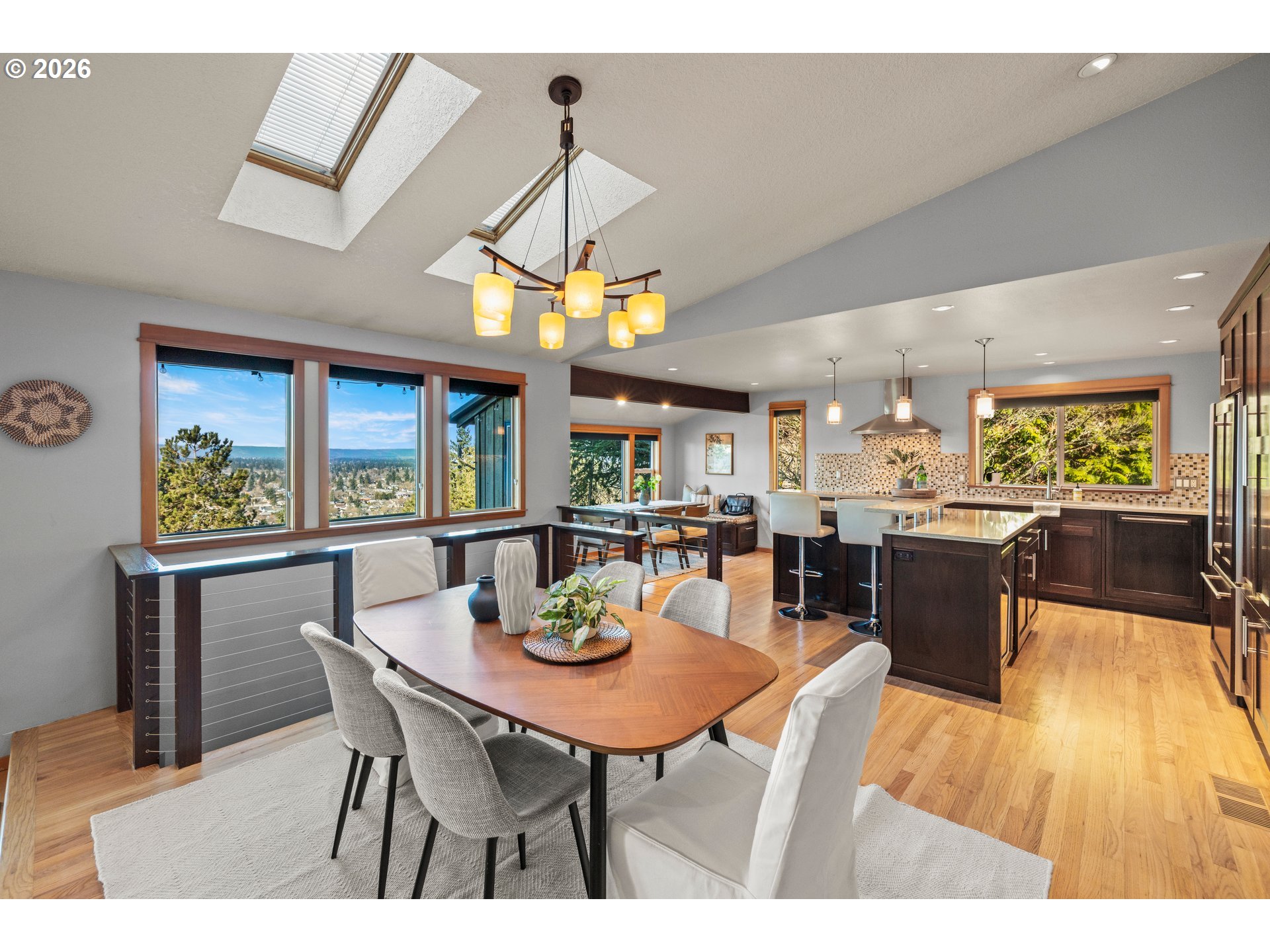 2831 Northeast Rocky Butte Road Portland, OR 97220 - Photo 7 of 33 a view of a dining room with furniture window and wooden floor