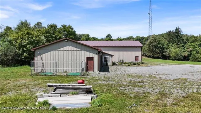 a house view with a garden space