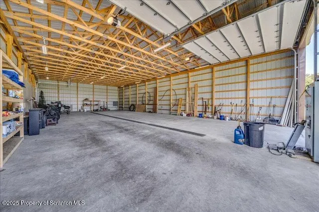a view of an empty room with windows