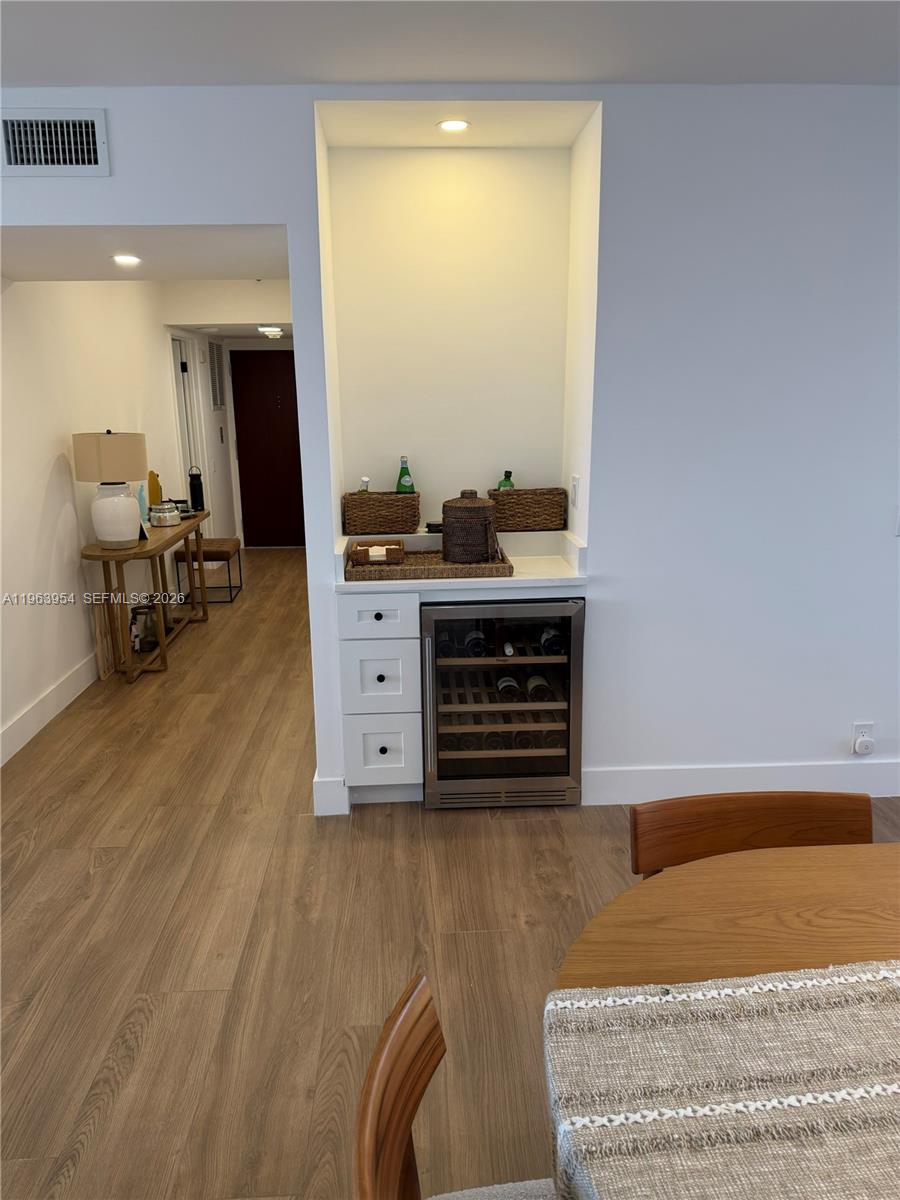 1541 Brickell Avenue, Unit B1504 Miami, FL 33129 - Photo 6 of 31 a living room with furniture and a fireplace