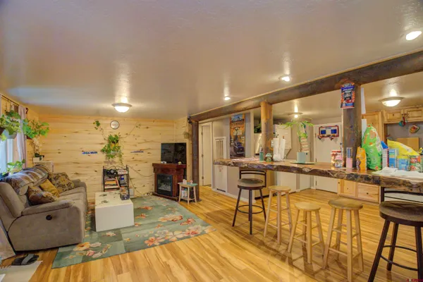 a view of a living room and dining room