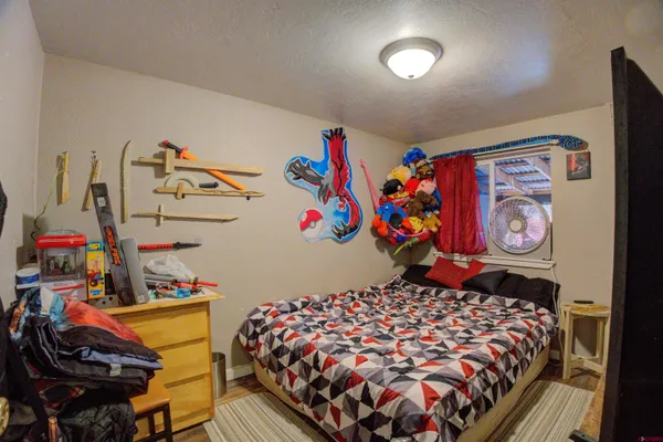 a bed room with a bed and a couch