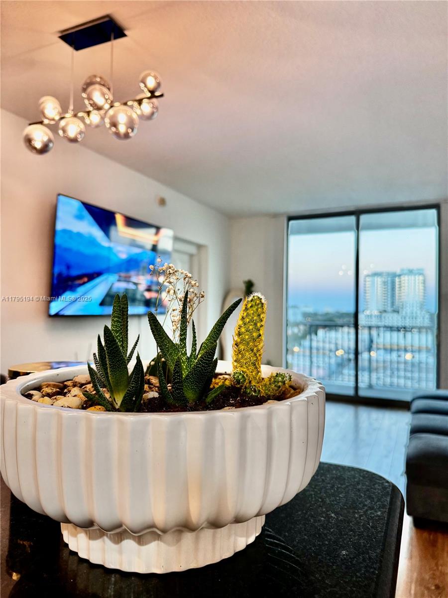 140 South Dixie Highway, Unit 921 Hollywood, FL 33020 - Photo 13 of 30 a view of a living room with a couch