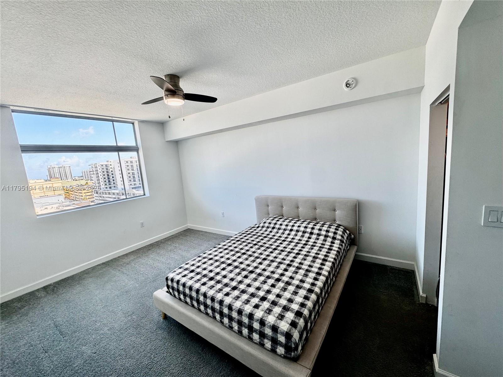 140 South Dixie Highway, Unit 921 Hollywood, FL 33020 - Photo 15 of 30 a bedroom with a bed and window