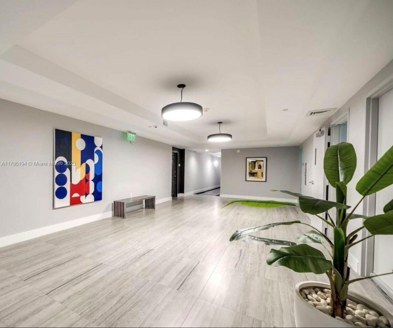 140 South Dixie Highway, Unit 921 Hollywood, FL 33020 - Photo 20 of 30 a view of a livingroom with furniture and window