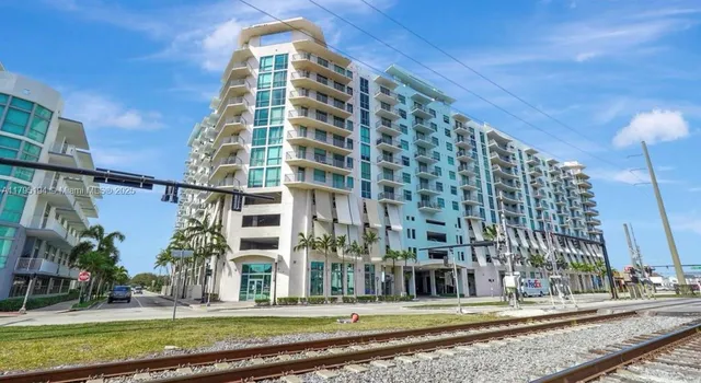 a view of a city with tall buildings