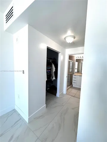 a reading room with furniture and wooden floor