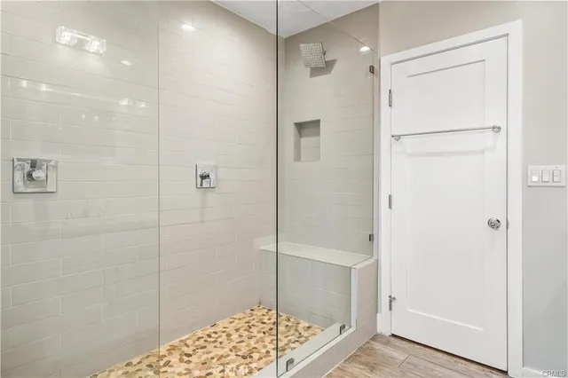 a view of room with window and hardwood floor